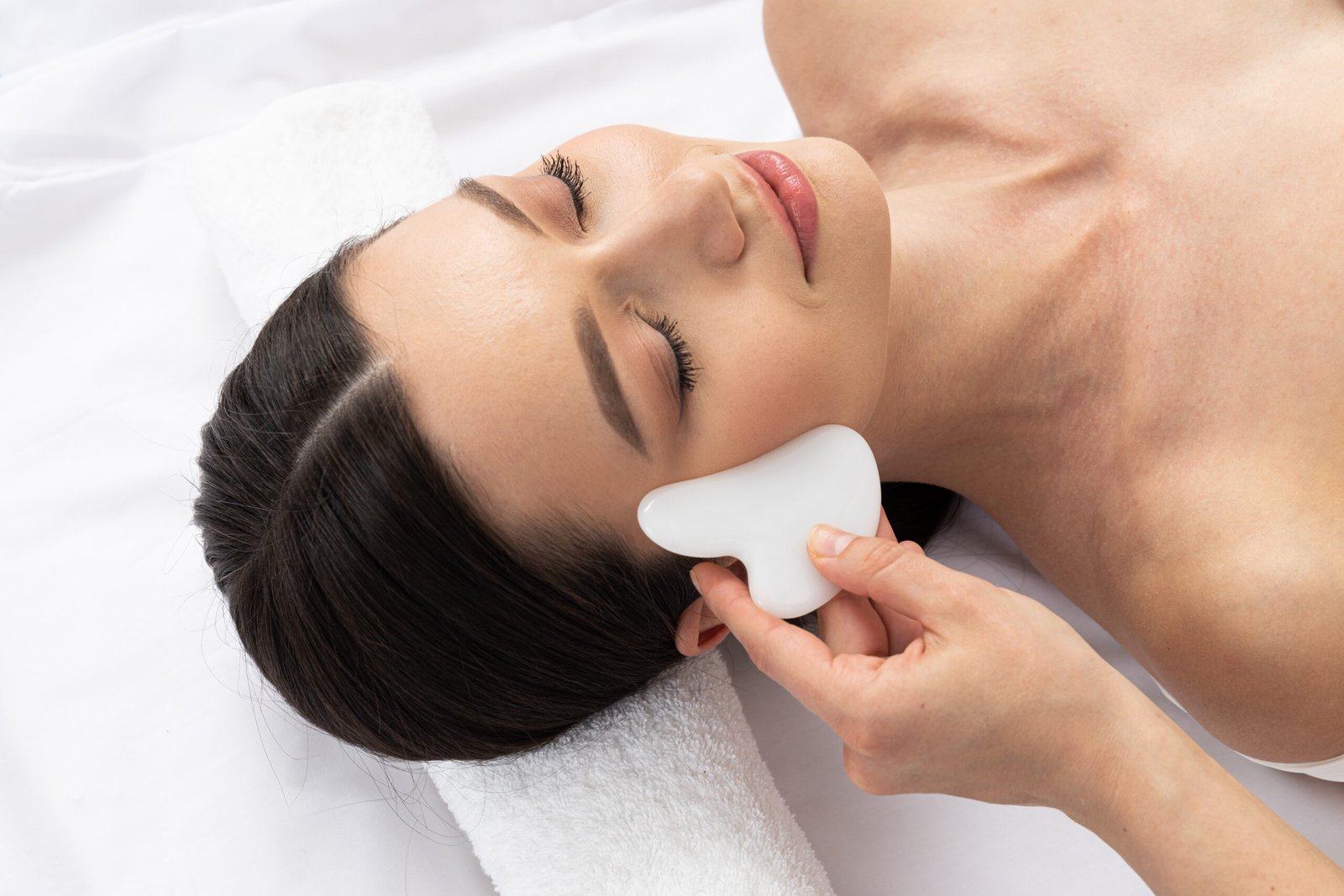 Concept of beauty, face care and skin care with young beautiful woman